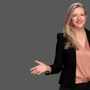 Photo of Kirryn smiling on grey background