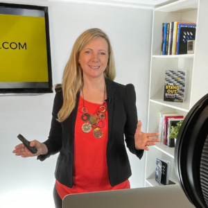 Photo of Kirryn presenting in a virtual studio
