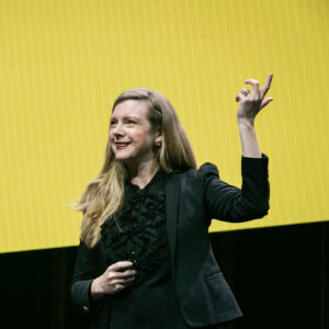 yellow background with Kirryn speaking