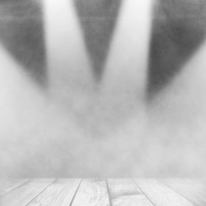 wooden stage of a theatre with lights
