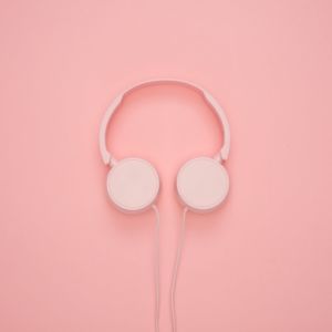 photo of headphones on a pink background