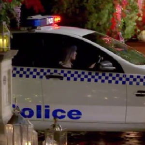 Arriving in a police car