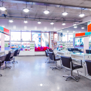 photo of the hair salon, chairs and coloured lights.