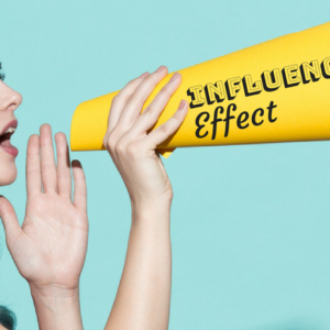 Lady holding a yellow speaker up that says Influencer effect