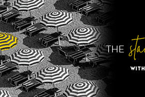 Black and white umbrella with the words "The Stand Out Effect"