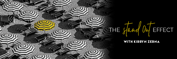 Black and white umbrella with the words "The Stand Out Effect"