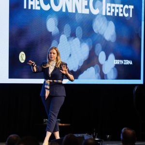 Kirryn on stage with words The Connect Effect