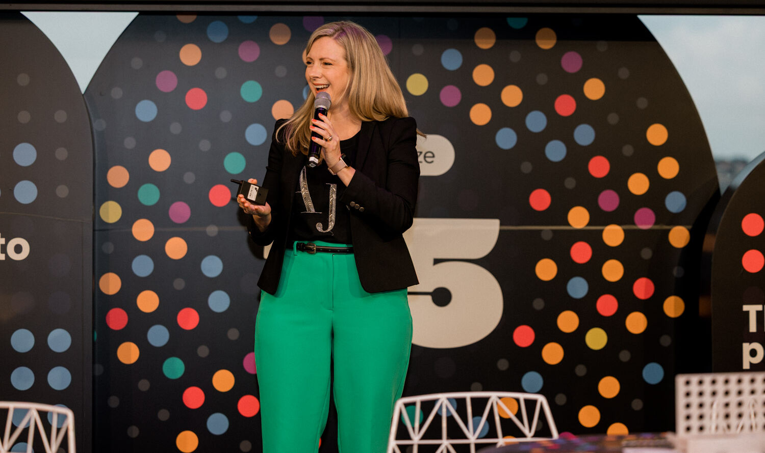 Kirryn Zerna on stage delivering a sales keynote