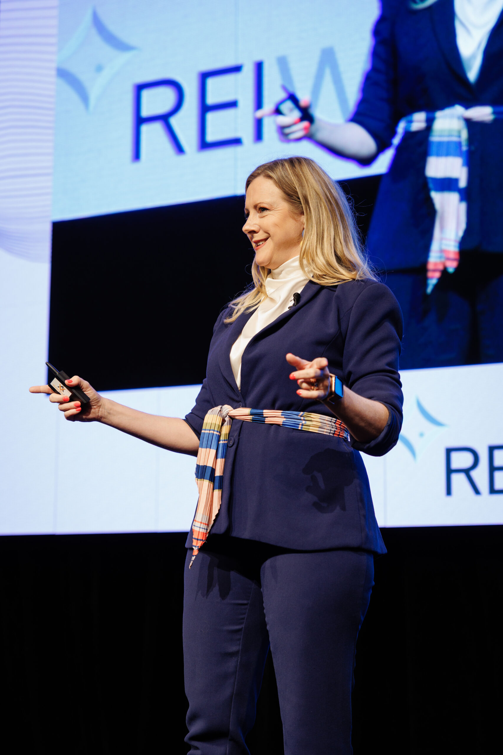 Kirryn Zerna delivering a keynote at the REIWA Conference